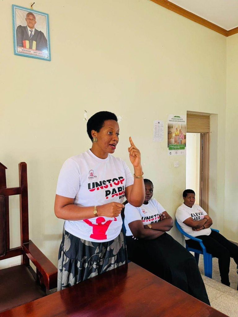 Loice Natukunda speaking at a community session