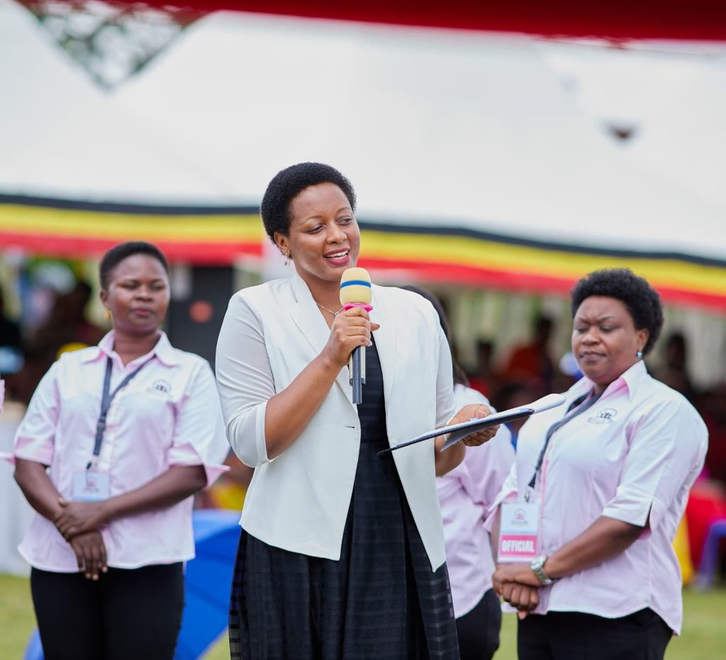 Loice Natukunda with members of the Elevate Her team at the launch