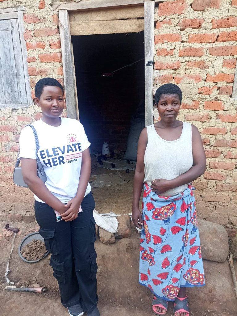A beneficiary with an Elevate Her trainer